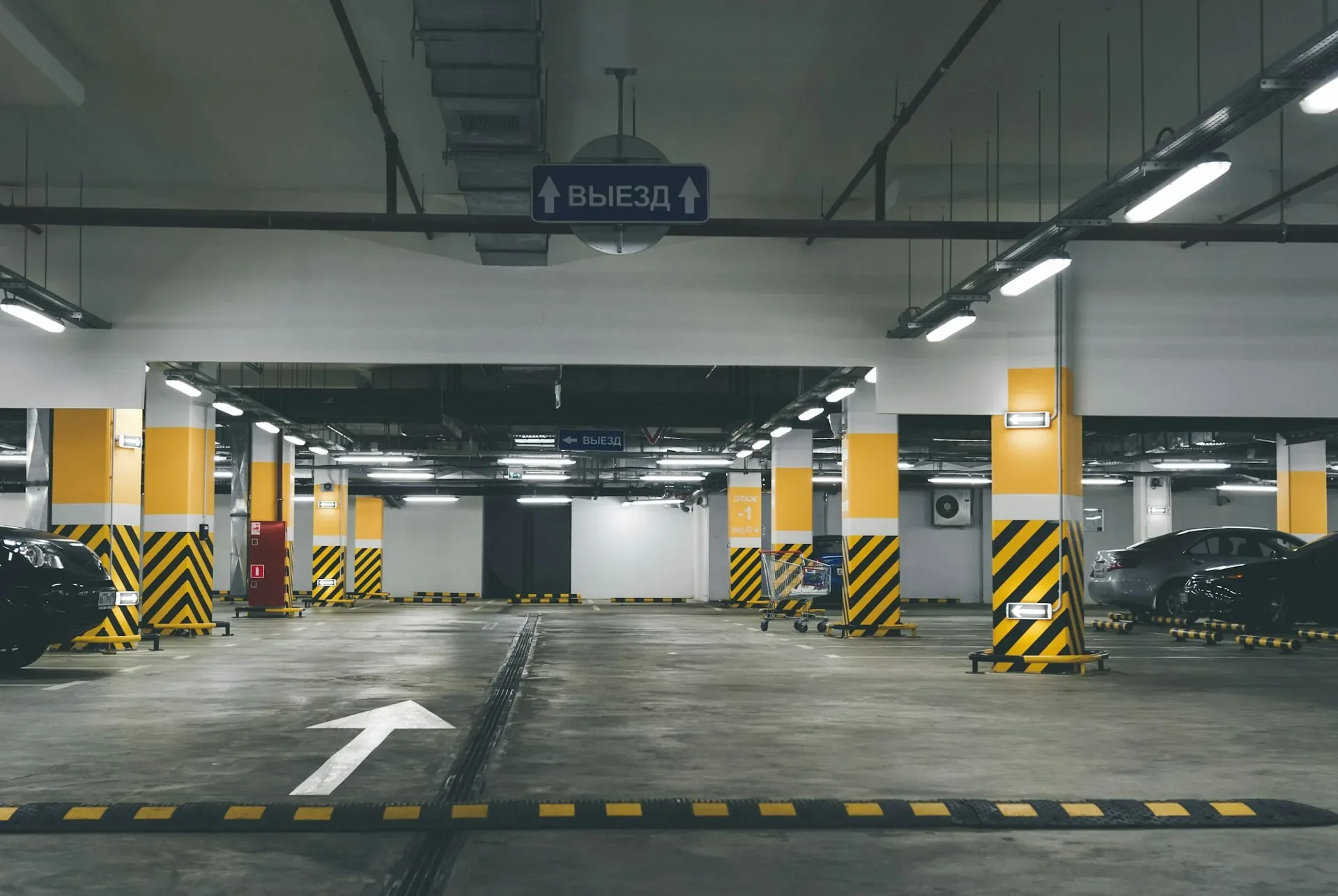 Interior of a modern parking garage with marked lanes